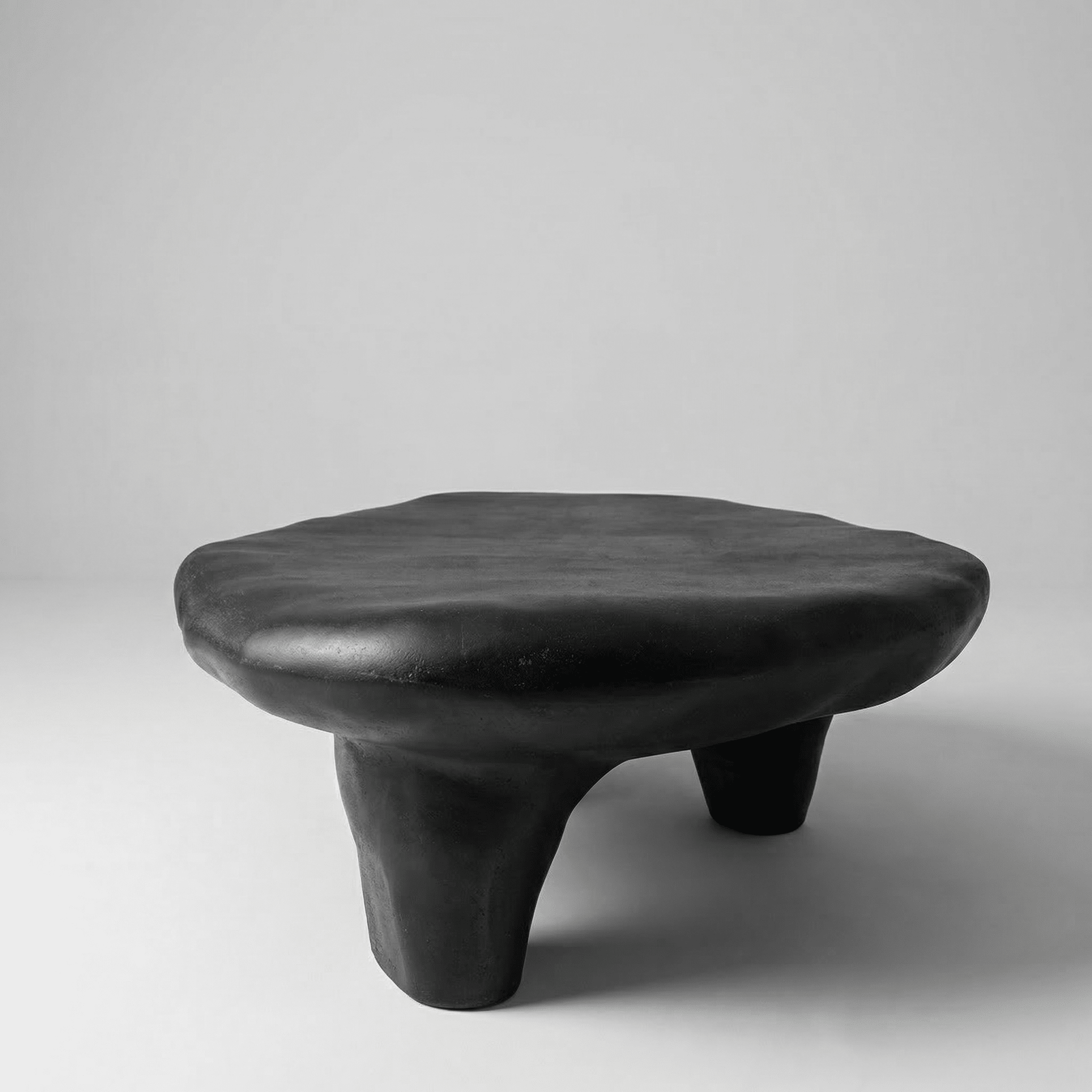 Sculpted Tripod Coffee Table - Artspire Home
