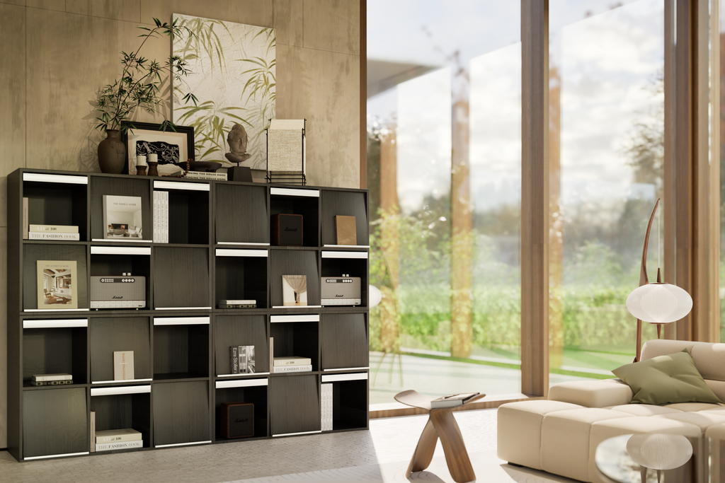 Modern living space with a sleek black bookshelf, neutral-toned sofa, and floor-to-ceiling windows overlooking greenery