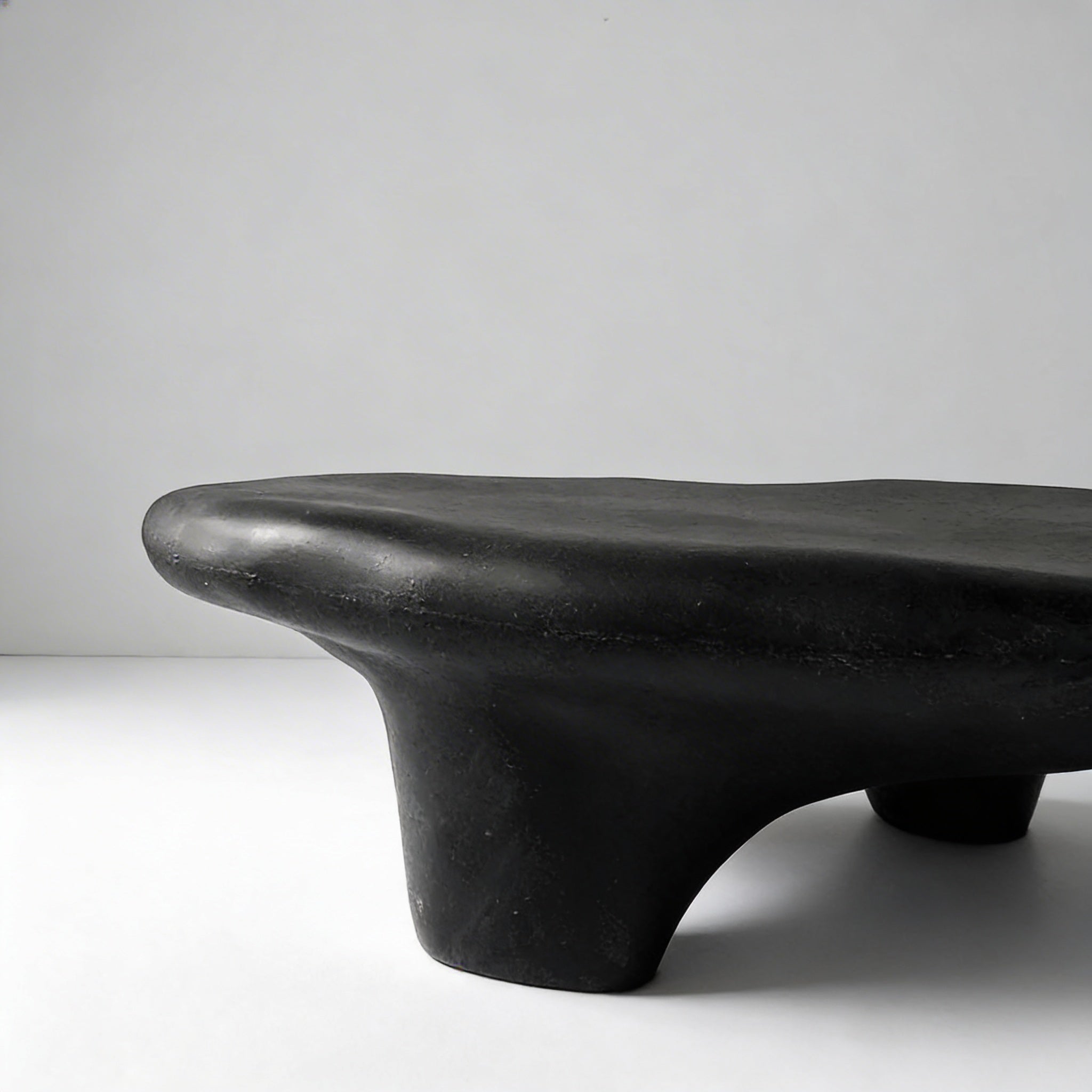 Sculpted Tripod Coffee Table - Artspire Home